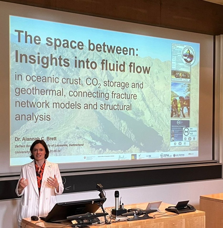 Alannah presenting a seminar on fluid flow in fractured rock to a lecture hall at the University of Lausanne